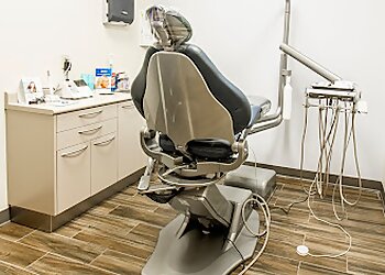 New Orleans Dentists John C. Tripp, DDS - 7 O'CLOCK DENTAL
