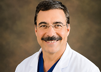 John E. Poulos, MD - PREMIER GASTROENTEROLOGY @ VALLEYGATE John E. Poulos, MD - Fayetteville, NC Gastroenterologists - Doctor Portrait Image