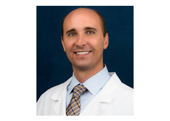 Jacksonville pain management doctor Justin K. Spooner, MD - BEACHES LASER SPINE & PAIN MEDICINE 