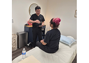 KALM Acupuncture & Integrative Medicine - San Bernardino, CA Acupuncture - Doctor With Patient Image