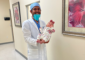 Leela S. Pillarisetty, MD - Midland, TX Gynecologists - Doctor With Patient Image