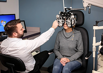 Luke A. Crader, OD - DENTON OPTOMETRY - Denton, TX Pediatric Optometrists - Doctor Working Image