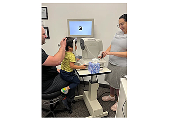 Maggie Miriam Yamin, OD - INSPIRE VISION THERAPY AND REHAB - Hollywood, FL Pediatric Optometrists - Doctor With Patient Image