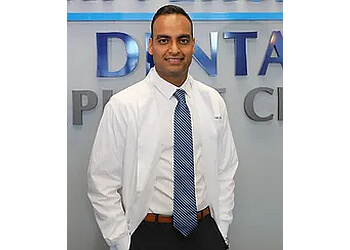 Manish, BDS, DMD, FICOI - Riverside Dental Springfield Cosmetic Dentists