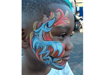 New Orleans Face Painting Mardi Gras Face and Body Painting