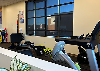Michelle E., DPT - ATHLETICO PHYSICAL THERAPY OVERLAND PARK - Overland Park, KS Physical Therapists - Clinic Interior Image