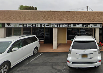 Orange Tattoo Shops Modo Ink Tattoo