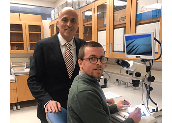 Madison Neurosurgeons Mustafa K. Baskaya, MD - UNIVERSITY OF WISCONSIN HOSPITALS