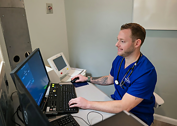 NasonCare - North Charleston, SC Urgent Care Clinics - Doctor Working Image