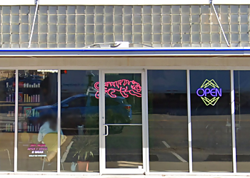 Norman Hair Salons Neon Tiger Salon