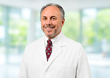 Norman S. Regal, DPM - TRIAD FOOT & ANKLE CENTER Norman S. Regal, DPM - Greensboro, NC Podiatrists - Doctor Portrait Image