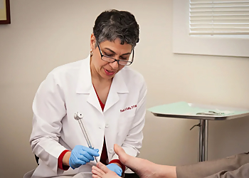 Pardis Kelly, DPM - North Las Vegas, NV Podiatrists - Doctor Working Image