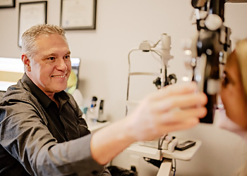 Paul Brinckman, OD - Olathe, KS Eye Doctors - Doctor With Patient Image