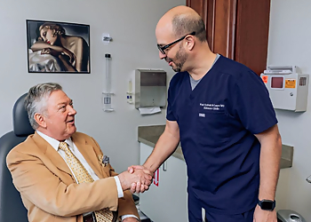 Paul Schalch Lepe, MD, FACS - San Diego, CA Ent Doctors - Doctor With Patient Image