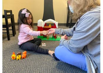Piller Child Development - Gilbert, AZ Occupational Therapists - Doctor With Patient Image