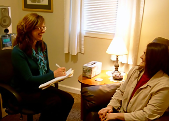 Rev. Sharon Flynn - HYPNOSIS AND HEALING CENTER - Newport News, VA Hypnotherapy - Doctor With Patient Image