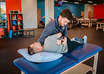 Rob Gruttadauria, PT, DPT, OCS - HIGHBAR, INC - Providence, RI Physical Therapists - Doctor Working Image
