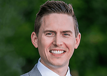Ryan N. Lawrence, DPM Ryan N. Lawrence, DPM - Grand Prairie, TX Podiatrists - Doctor With Patient Image
