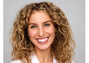 Sabrina Mara Dorfmann, DMD - Family Orthodontics Worcester - Worcester, MA Orthodontists - Doctor With Patient Image