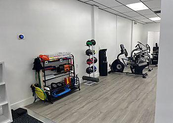 Shain Joseph, DPT - BOUNCE BACK PHYSICAL THERAPY - Coral Springs, FL Physical Therapists - Clinic Interior Image