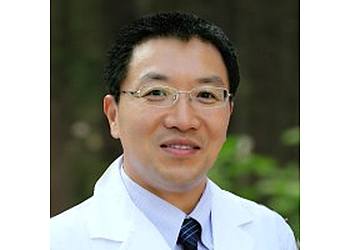 Shibin Yu, DDS - AFFORDABLE DENTURES Topeka Dentists image 1