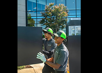 The Junkluggers of Greater Dallas - Garland, TX Junk Removal - Team Working Image