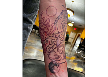 The Platinum Koi Tattoo Studio The Platinum Koi Tattoo Studio - Huntsville, AL Tattoo Shops - Design Image
