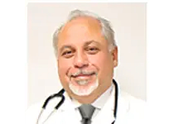 Thomas Ortiz, MD - AZZ MEDICAL ASSOCIATES Thomas Ortiz, MD - Newark, NJ Primary Care Physicians - Doctor Portrait Image