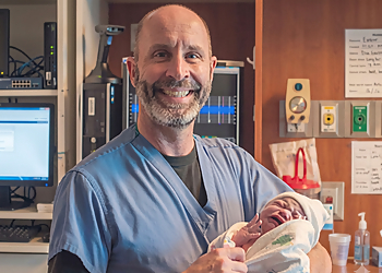 Timothy A. Hall, MD, FACOG - Independence, MO Gynecologists - Doctor With Patient Image