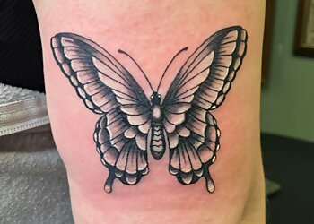 Trilogy Tattoos and Body Piercings Memphis Tattoo Shops image 1