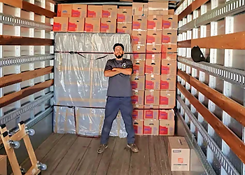 Two Men And A Truck Moving - Fontana, CA Moving Companies - Team Working Image