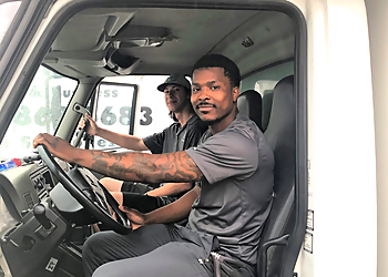 Two Men and a Truck Baltimore - Baltimore, MD Moving Companies - Team Working Image