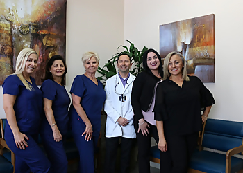 Hialeah Cosmetic Dentists Victor J. Dongo, DMD, MSC, FAGD, DICOI - MIAMI DENTIST & IMPLANTS