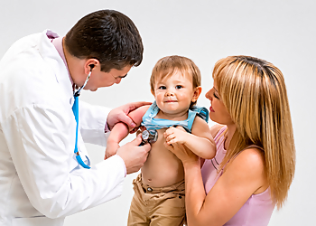 W. Luke Huang, MD - Fullerton, CA Pediatricians - Doctor With Patient Image