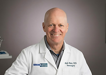 Wade M Mueller, MD - NEUROSCIENCE CENTER - SPECIALTY CLINICS Wade M Mueller, MD - Milwaukee, WI Neurosurgeons