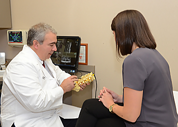William S. Minore, MD, FCCP, FASA, FICS, CPE - Rockford, IL Pain Management Doctors - Doctor Working Image